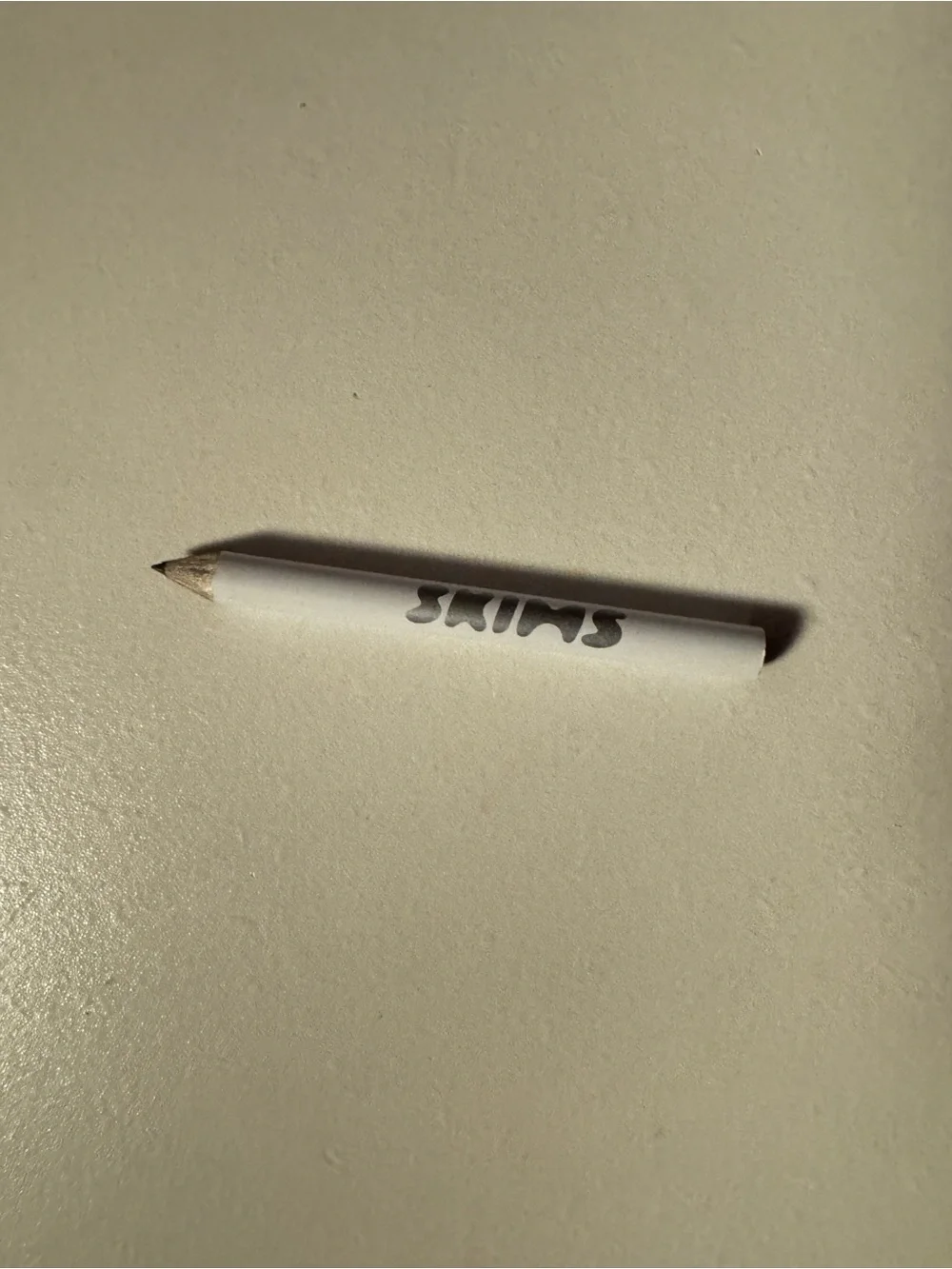 SKIMS compact white